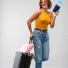 Travel Blanket and Pillow Set - Portable Inflatable Travel Neck Pillow and Premium Soft Airplane Blanket with Built-in Soft Bag, Neck Snaps, Zippered Pouch, and Hand Luggage Strap (Black & Pink) - Image 7